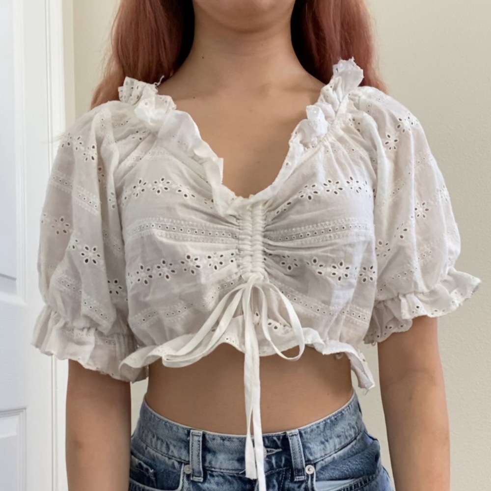 White ruffled crop top with lace detailing